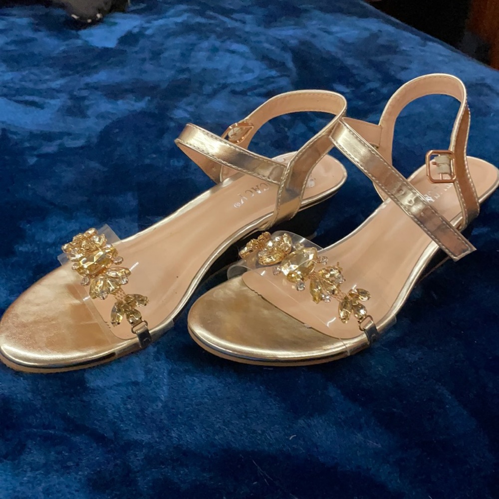 Delicacy , size 7 , 2 inch heels gold color